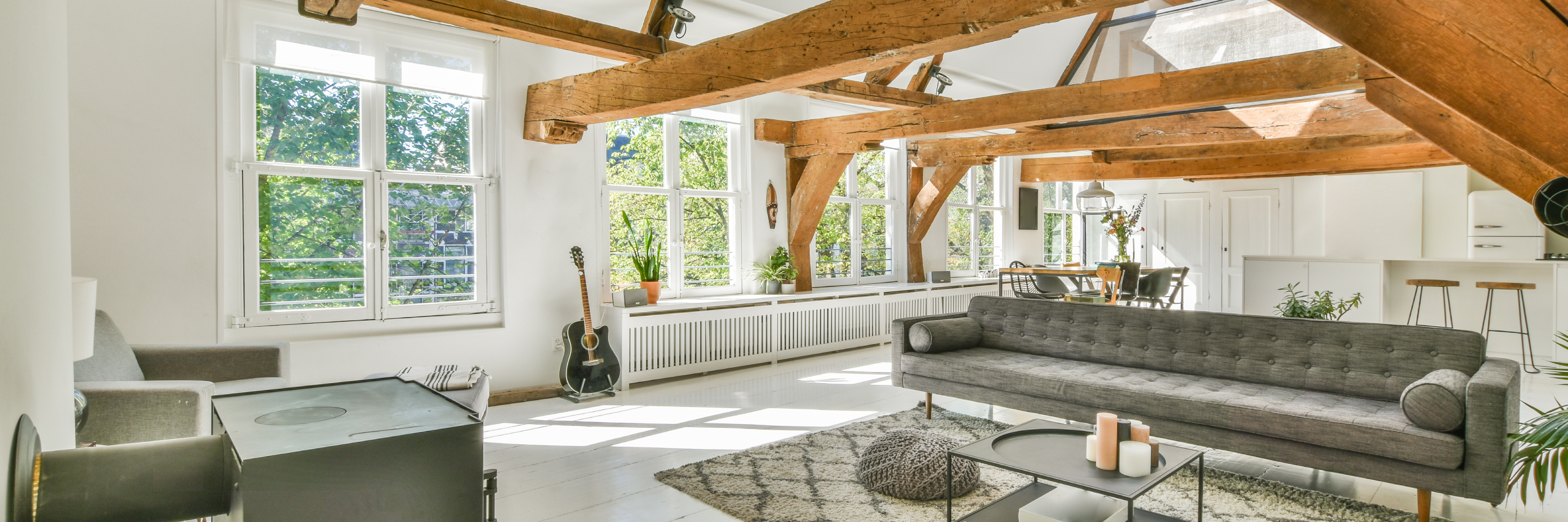 Bright Living Space with Exposed Beams and Wood