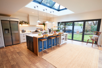 Bright Modern Kitchen with Island and Outdoor View