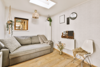 Comfortable Couch and Modern Decor in Bright Room